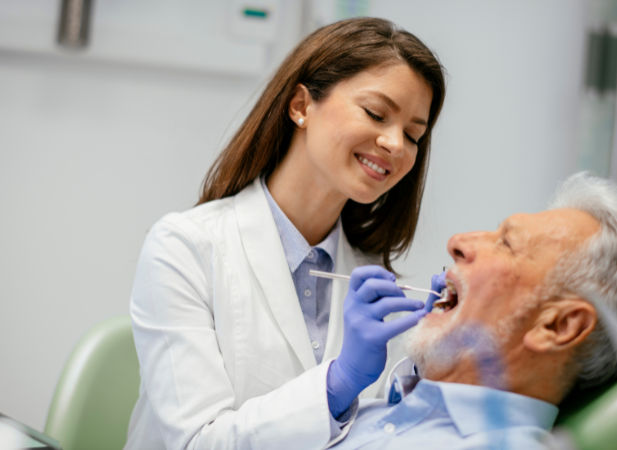 image of dentist adding a dental implant in surprise AZ